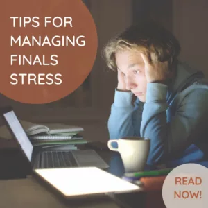 In this blog post, we cover tips for managing finals stress. Photo of student who is stressed out by their final exams. Read now!